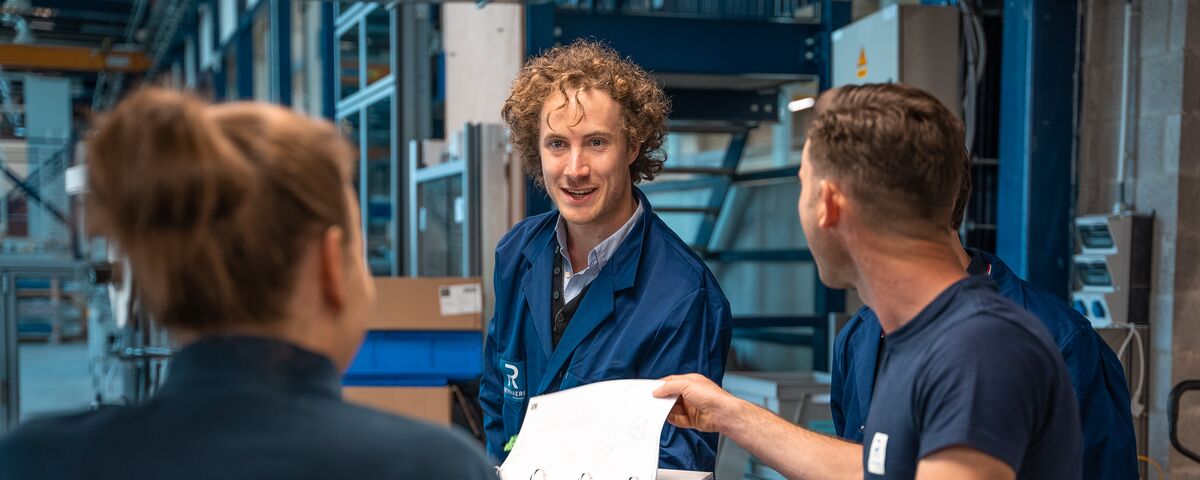 Reynaers Aluminium training centre looking through a training in a binder